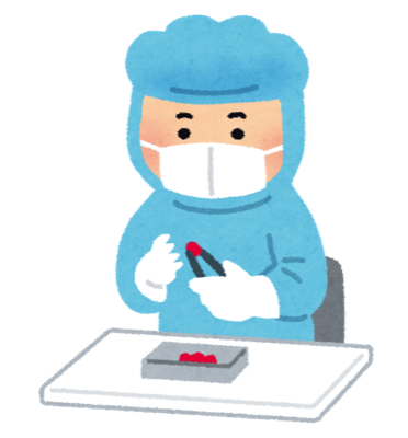 工場で目視検査をする人のイラスト